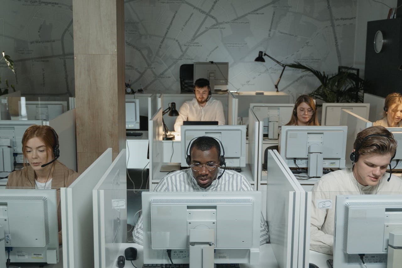 A group of people using the internet for customer support in Kathmandu.